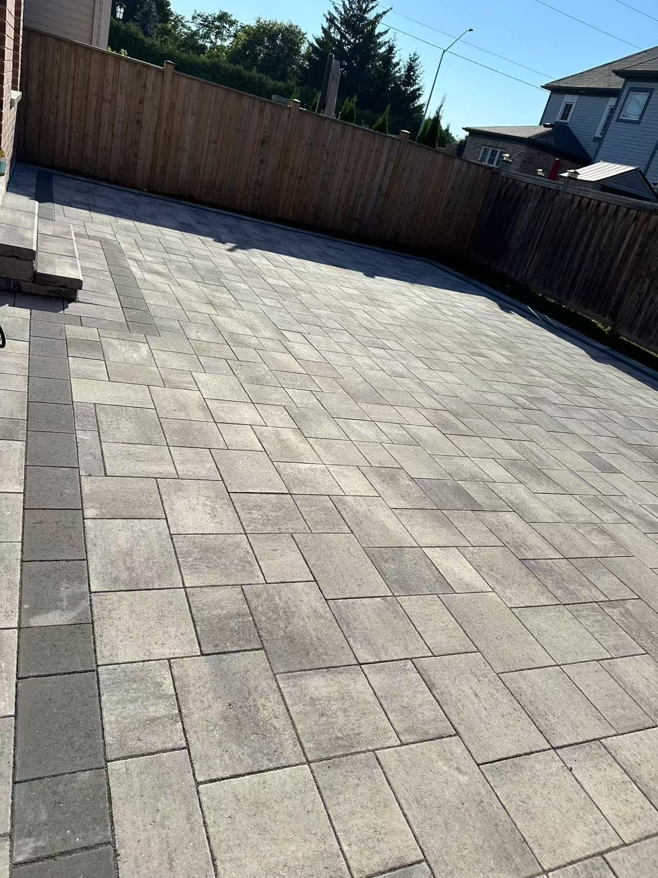Raised backyard interlock patio