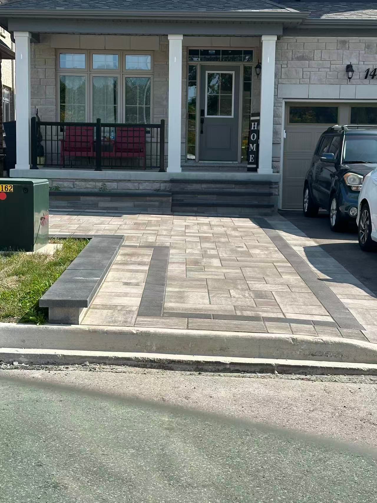 Front walkway with a contrasting paver border